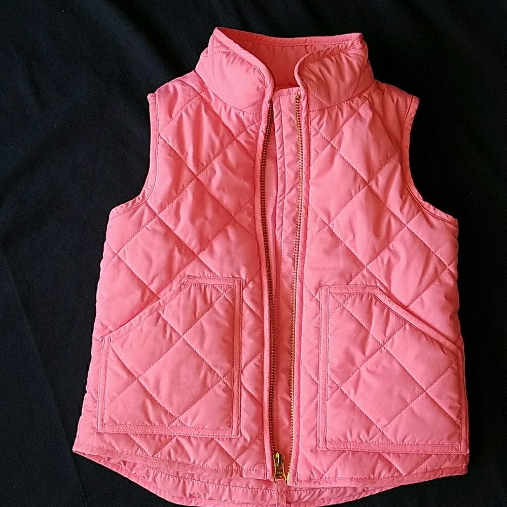 Pink puffy vest